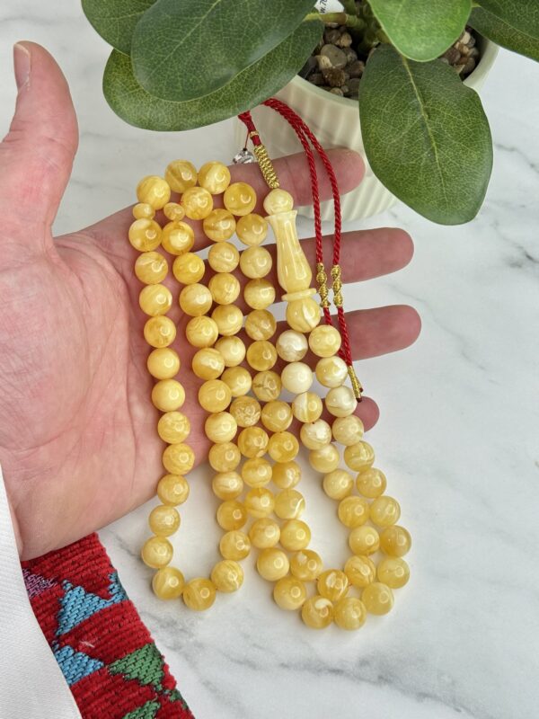 كهرم طبيعي لوقو فضي (الدليمي)