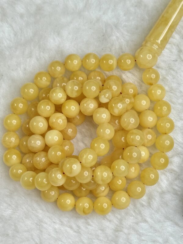 كهرم طبيعي 99 خرزه مع كركوشة زري