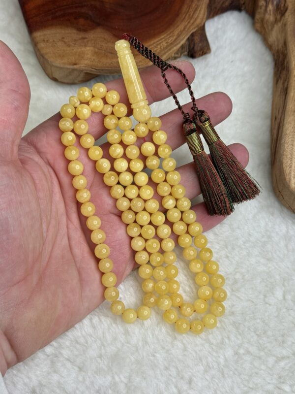 كهرم طبيعي 99 خرزه مع كركوشة زري