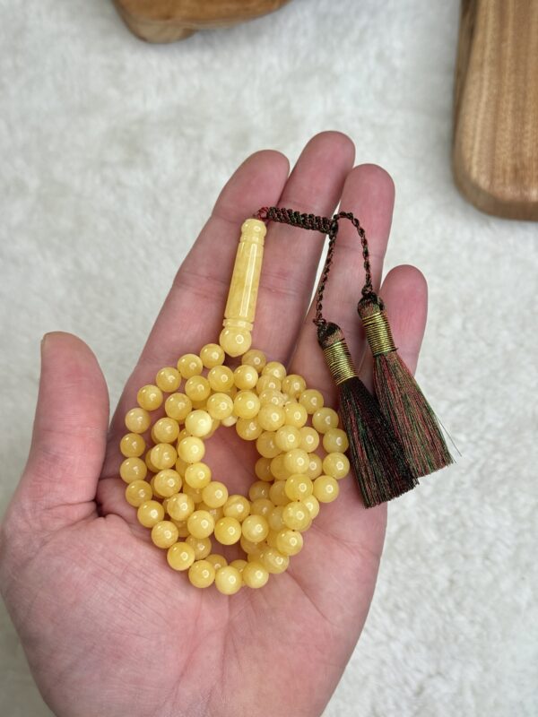 كهرم طبيعي 99 خرزه مع كركوشة زري