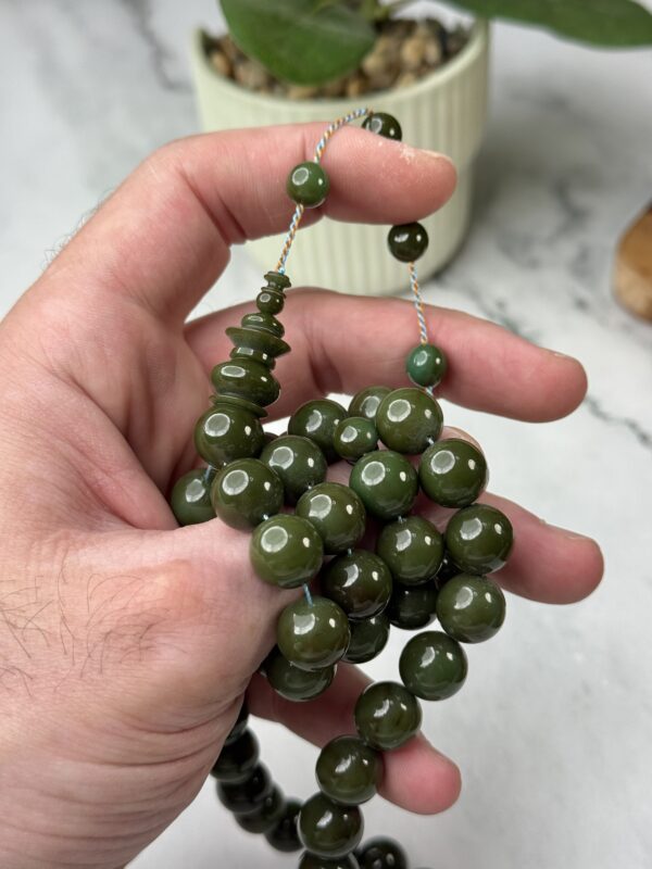 فاتوران فيروزي غامق