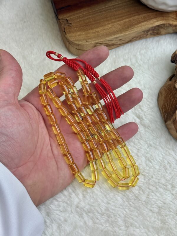 كهرم طبيعي شفاف عسلي (برميلي)